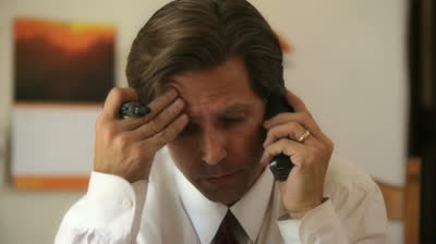 stock-footage-stressed-salesman-making-a-call-on-the-phone